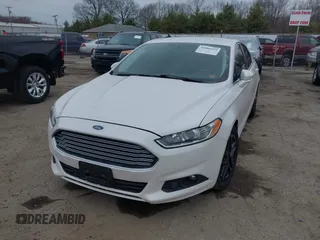 2015 Ford Fusion SE with VIN 3FA6P0HD9FR203805, listed as a IAAI auction lot 41880129 with 136,637 mi miles. Bid and sale history available at carsss.com. Image 2.