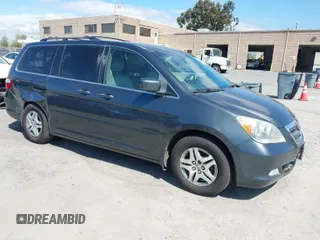 2005 Honda Odyssey TOURING with VIN 5FNRL38885B082482, listed as a IAAI auction lot 41879897 with 159,667 mi miles. Bid and sale history available at carsss.com. Image 1.