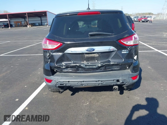 2013 Ford Escape SEL with VIN 1FMCU9H95DUA46183, listed as a IAAI auction lot 41903684 with 243,026 mi miles. Bid and sale history available at carsss.com. Image 6.
