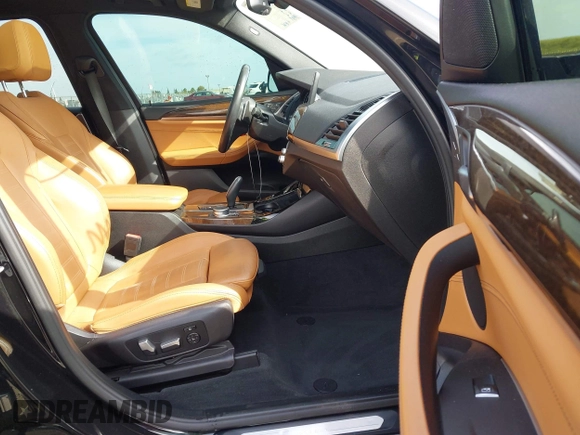 2019 BMW X3 xDrive30i with VIN 5UXTR9C52KLR11316, listed as a IAAI auction lot 42002750 with 58,127 mi miles and . Bid and sale history available at DreamBid. Image 5.