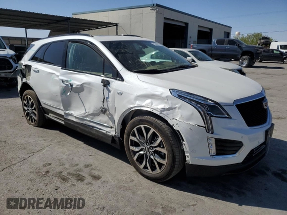 2021 Cadillac XT5 AWD Sport with VIN 1GYKNHRS2MZ156923, listed as a Copart auction lot 52696375 with 19,619 mi miles and Salvage title. Bid and sale history available at DreamBid. Image 4.