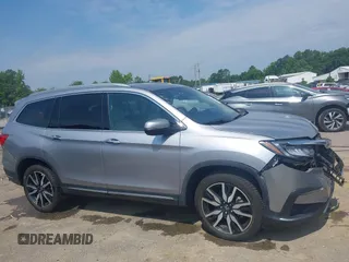 2019 Honda Pilot Elite with VIN 5FNYF6H08KB025449, listed as a IAAI auction lot 42450139 with 98,368 mi miles and . Bid and sale history available at DreamBid. Image 13.