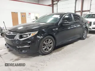 2016 Kia Optima LX Turbo with VIN 5XXGT4L16GG013751, listed as a IAAI auction lot 41843481 with 163,969 mi miles. Bid and sale history available at carsss.com. Image 2.