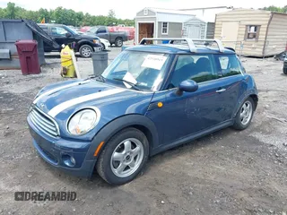 2009 MINI Hardtop with VIN WMWMF33509TU74290, listed as a IAAI auction lot 42538919 with 104,209 mi miles and . Bid and sale history available at DreamBid. Image 17.
