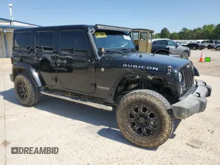 2016 Jeep Wrangler Unlimited Rubicon with VIN 1C4BJWFG5GL290757, listed as a Copart auction lot 52099225 with 102,424 mi miles and Salvage title. Bid and sale history available at DreamBid. Image 4.