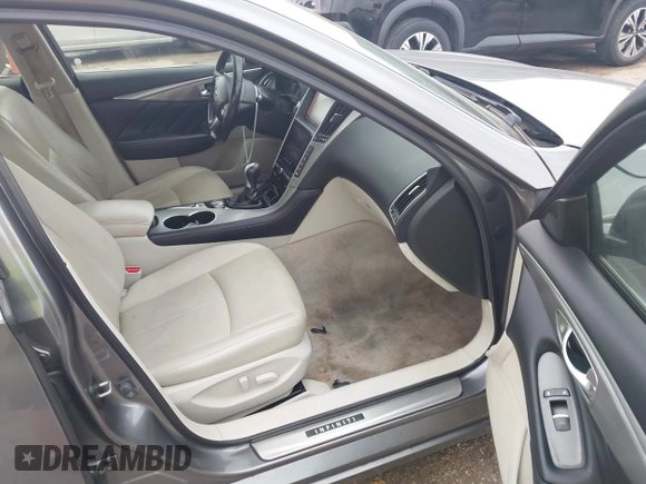 2015 Infiniti Q50 Premium z VIN JN1BV7AR9FM413801, wystawiony jako IAAI lot #42134770 z przebiegiem 111 367 mil mil oraz . Historia ofert i sprzedaży dostępna na DreamBid. Obrazek 5.