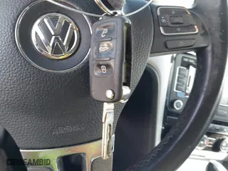 2013 Volkswagen Passat SE with VIN 1VWBP7A32DC144639, listed as a IAAI auction lot 41337338 with 147,878 mi miles. Bid and sale history available at carsss.com. Image 11.