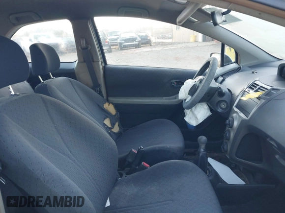 2009 Toyota Yaris with VIN JTDJT903495243871, listed as a IAAI auction lot 41753770 with 189,944 mi miles and . Bid and sale history available at DreamBid. Image 5.