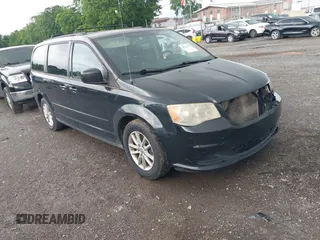 2014 Dodge Grand Caravan SXT z VIN 2C4RDGCG4ER477055, wystawiony jako IAAI lot #42341760 z przebiegiem 230 851 mil mil oraz . Historia ofert i sprzedaży dostępna na DreamBid. Obrazek 1.