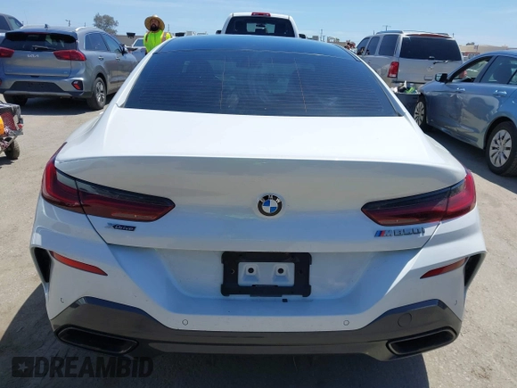 2022 BMW 8 Series M850i z VIN WBAGV8C02NCH87808, wystawiony jako IAAI lot #42255995 z przebiegiem 34 285 mil mil oraz . Historia ofert i sprzedaży dostępna na DreamBid. Obrazek 16.