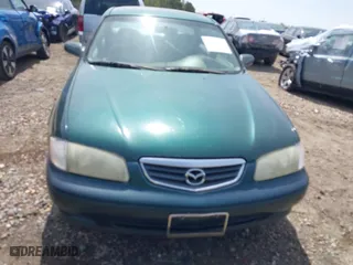 2001 Mazda 626 LX with VIN 1YVGF22D915241384, listed as a IAAI auction lot 41927705 with 231,801 mi miles. Bid and sale history available at carsss.com. Image 6.