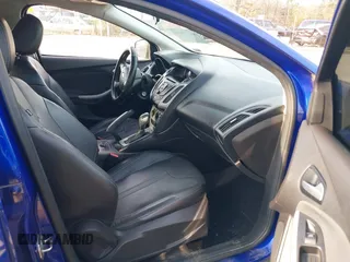 2013 Ford Focus SE with VIN 1FADP3F25DL198429, listed as a IAAI auction lot 41136019 with 123,810 mi miles. Bid and sale history available at carsss.com. Image 5.