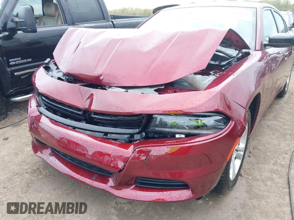 2023 Dodge Charger SXT with VIN 2C3CDXBG9PH659726, listed as a IAAI auction lot 42103636 with 14,321 mi miles and . Bid and sale history available at DreamBid. Image 6.