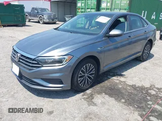 2019 Volkswagen Jetta SEL z VIN 3VWE57BU0KM110267, wystawiony jako IAAI lot #42161272 z przebiegiem 63 955 mil mil oraz . Historia ofert i sprzedaży dostępna na DreamBid. Obrazek 2.