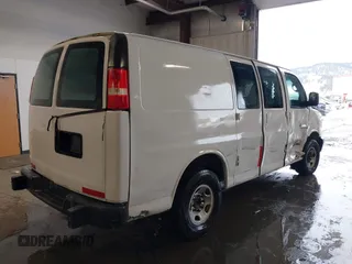 2005 GMC Savana Cargo Van with VIN 1GTGG25V451900301, listed as a IAAI auction lot 41637546 with 237,623 mi miles. Bid and sale history available at carsss.com. Image 4.