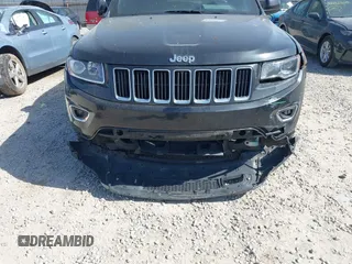 2014 Jeep Grand Cherokee Laredo with VIN 1C4RJEAG0EC442053, listed as a IAAI auction lot 42098601 with 200,982 mi miles and . Bid and sale history available at DreamBid. Image 6.