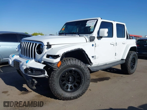 2021 Jeep Wrangler Unlimited Sahara with VIN 1C4JJXP63MW716690, listed as a IAAI auction lot 42087879 with 40,889 mi miles and . Bid and sale history available at DreamBid. Image 6.
