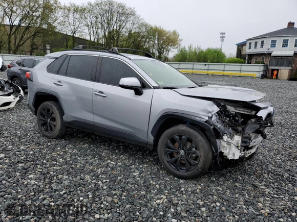 2022 Toyota RAV4 Hybrid SE with VIN JTM16RFV6ND050363, listed as a Copart auction lot 55931115 with 39,372 mi miles and Salvage title. Bid and sale history available at DreamBid. Image 4.