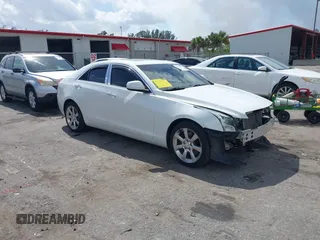 2016 Cadillac ATS Standard AWD z VIN 1G6AG5RX9G0106151, wystawiony jako IAAI lot #41710613 z przebiegiem 82 893 mil mil oraz . Historia ofert i sprzedaży dostępna na DreamBid. Obrazek 1.
