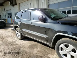 2012 Jeep Grand Cherokee Laredo with VIN 1C4RJEAG2CC215525, listed as a Copart auction lot 51876105 with 148,659 mi miles and Salvage Title. Bid and sale history available at carsss.com. Image 12.