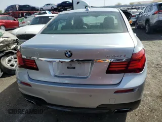 2015 BMW 7 Series 740Li with VIN WBAYE4C52FD947168, listed as a Copart auction lot 71287564 with 103,444 mi miles and Salvage Title. Bid and sale history available at DreamBid. Image 6.