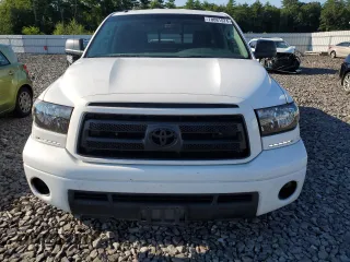 2010 Toyota Tundra 4WD Truck with VIN 5TFUY5F10AX128464, listed as a Copart auction lot 70081574 with 229,736 mi miles and Clean Title. Bid and sale history available at carsss.com. Image 5.