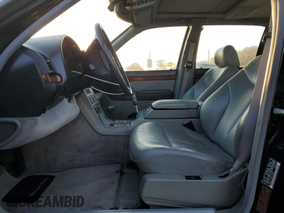1994 Mercedes-Benz S with VIN WDBGA51EXRA151386, listed as a Copart auction lot 77036644 with 43,224 mi miles and Clean Title. Bid and sale history available at DreamBid. Image 7.