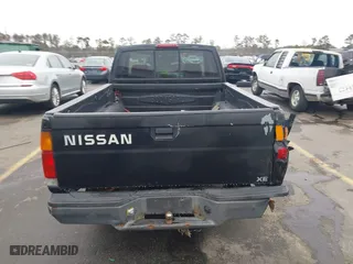 1996 Nissan Trucks 2WD XE with VIN 1N6SD16S5TC385180, listed as a IAAI auction lot 41345326 with 262,211 mi miles. Bid and sale history available at carsss.com. Image 16.