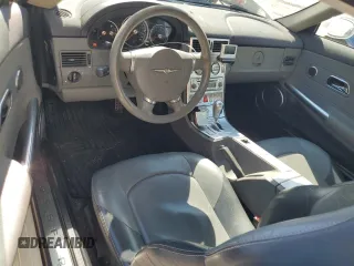 2004 Chrysler Crossfire with VIN 1C3AN69L04X024094, listed as a Copart auction lot 47047425 with 210,638 mi miles and Salvage title. Bid and sale history available at DreamBid. Image 8.