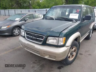 1999 Isuzu Trooper S z VIN JACDJ58X6X7922527, wystawiony jako IAAI lot #42461607 z przebiegiem 171 888 mil mil oraz . Historia ofert i sprzedaży dostępna na DreamBid. Obrazek 6.