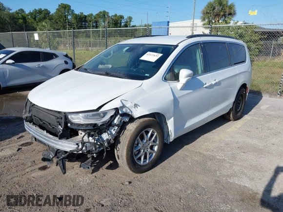 2022 Chrysler Pacifica Touring L with VIN 2C4RC1BGXNR233654, listed as a IAAI auction lot 42137632 with 73,899 mi miles and . Bid and sale history available at DreamBid. Image 18.