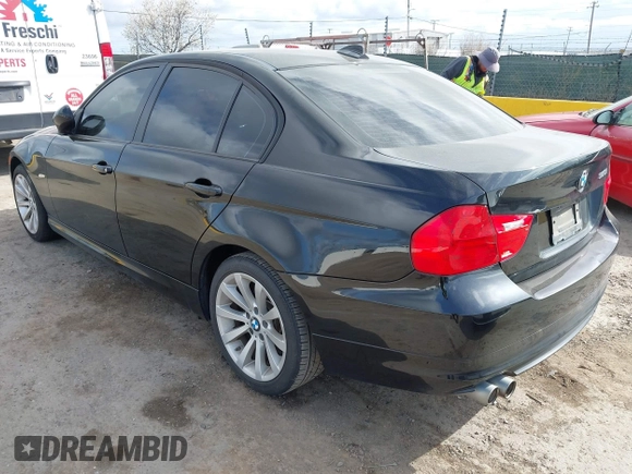 2011 BMW 3 Series 328i with VIN WBAPH5C5XBF216401, listed as a IAAI auction lot 41890987 with 114,698 mi miles and . Bid and sale history available at carsss.com. Image 3.