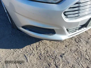 2015 Ford Fusion S Hybrid with VIN 3FA6P0UU0FR307900, listed as a IAAI auction lot 41507112 with 150,257 mi miles. Bid and sale history available at carsss.com. Image 6.