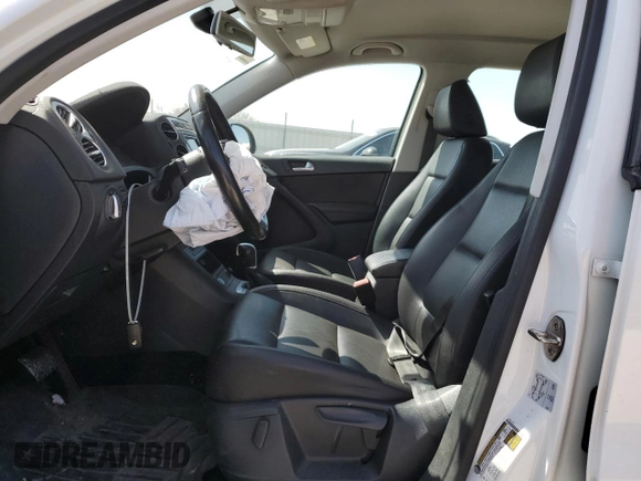 2017 Volkswagen Tiguan S with VIN WVGBV7AX8HK028302, listed as a Copart auction lot 52617685 with 108,191 mi miles and Salvage Title. Bid and sale history available at DreamBid. Image 7.