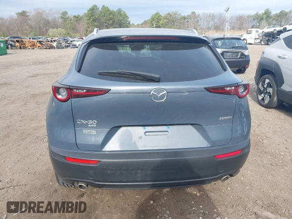 2023 Mazda CX-30 S Carbon Edition with VIN 3MVDMBCM8PM502891, listed as a IAAI auction lot 42050533 with 20,035 mi miles and . Bid and sale history available at DreamBid. Image 16.