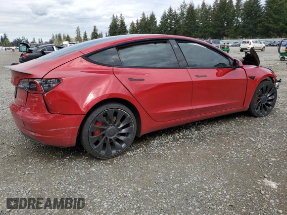 2022 Tesla Model 3 Performance with VIN 5YJ3E1EC6NF244817, listed as a Copart auction lot 51681565 with Not Provided miles and Salvage Title. Bid and sale history available at DreamBid. Image 3.