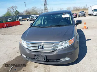 2012 Honda Odyssey Touring with VIN 5FNRL5H9XCB077351, listed as a IAAI auction lot 42045976 with 146,290 mi miles and . Bid and sale history available at DreamBid. Image 12.