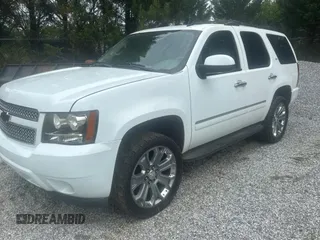 2009 Chevrolet Tahoe LTZ with VIN 1GNFK330X9J100915, listed as a Copart auction lot 55279675 with 254,708 mi miles and Salvage title. Bid and sale history available at DreamBid. Image 2.
