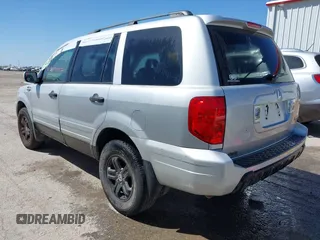 2003 Honda Pilot EX with VIN 2HKYF18523H501518, listed as a IAAI auction lot 41907387 with 234,473 mi miles and . Bid and sale history available at DreamBid. Image 3.