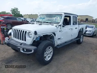 2023 Jeep Gladiator Sport S with VIN 1C6HJTAG3PL532694, listed as a IAAI auction lot 42446863 with 40,525 mi miles and . Bid and sale history available at DreamBid. Image 2.