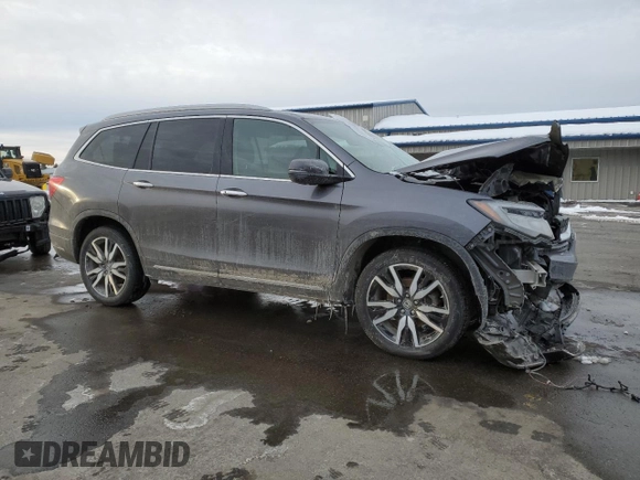 2022 Honda Pilot Touring 7-Passenger with VIN 5FNYF6H64NB014327, listed as a Copart auction lot 45166475 with 66,779 mi miles and Salvage Title. Bid and sale history available at carsss.com. Image 4.