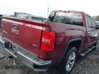 2014 GMC Sierra 1500 SLT with VIN 3GTP1VEC5EG542970, listed as a IAAI auction lot 41551962 with 165,740 mi miles and . Bid and sale history available at DreamBid. Image 4.