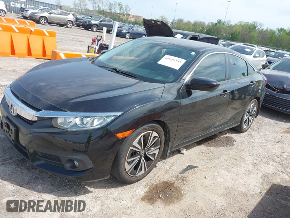 2016 Honda Civic Sedan EX-L with VIN 19XFC1F70GE011836, listed as a IAAI auction lot 41929383 with 186,497 mi miles. Bid and sale history available at carsss.com. Image 17.