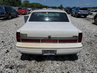 1996 Lincoln Town Car Executive z VIN 1LNLM81W4TY641611, wystawiony jako Copart lot #44939405 z przebiegiem 296 702 mil mil oraz Szkoda całkowita • Salvage title. Historia ofert i sprzedaży dostępna na DreamBid. Obrazek 6.