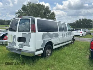 2002 Chevrolet Express z VIN 1GAHG39R921243538, wystawiony jako Copart lot #59032045 z przebiegiem 512 936 mil mil oraz Tytuł czysty. Historia ofert i sprzedaży dostępna na DreamBid. Obrazek 4.