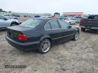 1997 BMW 5 Series 540i z VIN WBADE6326VBW50947, wystawiony jako IAAI lot #42407866 z przebiegiem 176 266 mil mil oraz . Historia ofert i sprzedaży dostępna na DreamBid. Obrazek 4.