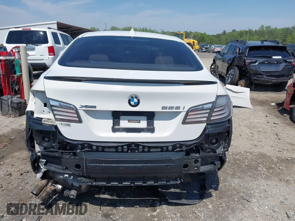 2013 BMW 5 Series 528i xDrive with VIN WBAXH5C52DD113388, listed as a IAAI auction lot 41997250 with 145,990 mi miles and . Bid and sale history available at carsss.com. Image 17.