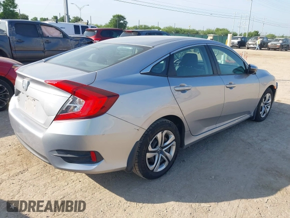 2018 Honda Civic LX with VIN 19XFC2F59JE024029, listed as a IAAI auction lot 42226509 with 85,115 mi miles and . Bid and sale history available at DreamBid. Image 4.