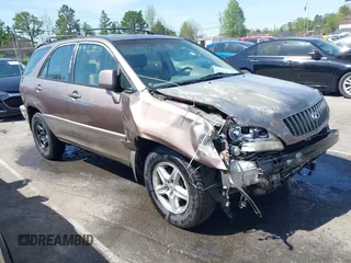1999 Lexus RX 300 z VIN JT6GF10U1X0012035, wystawiony jako IAAI lot #41934622 z przebiegiem 328 245 mil mil oraz . Historia ofert i sprzedaży dostępna na DreamBid. Obrazek 1.
