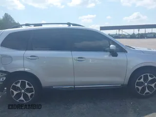 2015 Subaru Forester XT Touring z VIN JF2SJGUC4FH449213, wystawiony jako IAAI lot #42128074 z przebiegiem 112 373 mil mil oraz . Historia ofert i sprzedaży dostępna na DreamBid. Obrazek 13.